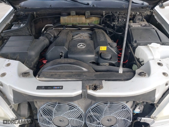 2003 Mercedes-Benz M-Class 3.7L with VIN 4JGAB57EX3A435535, listed as a IAAI auction lot 42099551 with 205,226 mi miles. Bid and sale history available at carsss.com. Image 10.