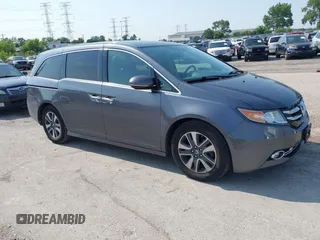 2016 Honda Odyssey Touring Elite with VIN 5FNRL5H97GB101711, listed as a IAAI auction lot 42488010 with 140,839 mi miles and . Bid and sale history available at DreamBid. Image 1.