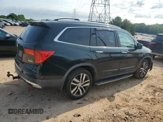 2018 Honda Pilot Elite with VIN 5FNYF6H03JB019900, listed as a Copart auction lot 57497235 with 60,358 mi miles and Salvage title. Bid and sale history available at DreamBid. Image 3.