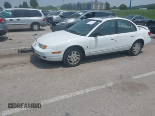 2002 Saturn SL с VIN 1G8ZK52732Z222128, выставлен на аукционе IAAI как лот 42476981 с пробегом 165 454 миль миль и . История ставок и продаж доступна на DreamBid. Изображение 2.