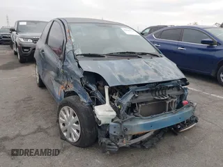 2008 Toyota Yaris with VIN JTDJT923585174474, listed as a IAAI auction lot 42025174 with 126,500 mi miles. Bid and sale history available at carsss.com. Image 1.
