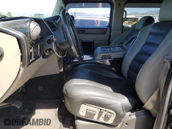2003 Hummer H2 with VIN 5GRGN23U73H122529, listed as a Copart auction lot 50157934 with 0 mi miles and Salvage Title. Bid and sale history available at carsss.com. Image 7.