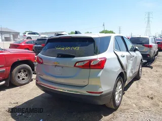 2018 Chevrolet Equinox LT z VIN 2GNAXJEV5J6309683, wystawiony jako IAAI lot #42238143 z przebiegiem 77 164 mil mil oraz . Historia ofert i sprzedaży dostępna na DreamBid. Obrazek 4.