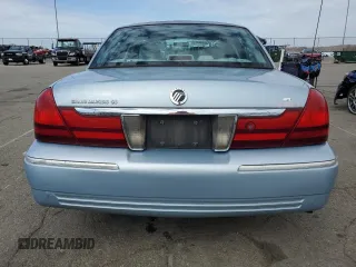 2005 Mercury Grand Marquis GS z VIN 2MEFM74W25X624329, wystawiony jako Copart lot #50945805 z przebiegiem 140 717 mil mil oraz Tytuł czysty. Historia ofert i sprzedaży dostępna na DreamBid. Obrazek 6.