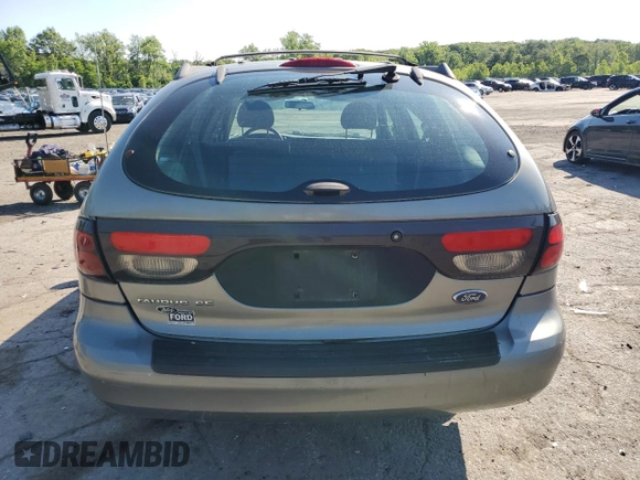 2004 Ford Taurus SE with VIN 1FAFP58S44A108250, listed as a Copart auction lot 58520615 with 119,575 mi miles and Salvage title. Bid and sale history available at DreamBid. Image 6.
