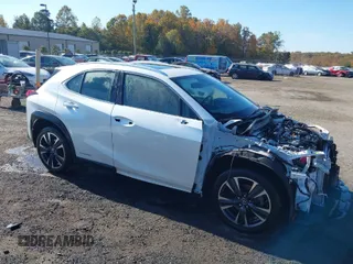 2021 Lexus UX with VIN JTHP9JBH5M2053797, listed as a IAAI auction lot 40718103 with 57,366 mi miles. Bid and sale history available at carsss.com. Image 1.