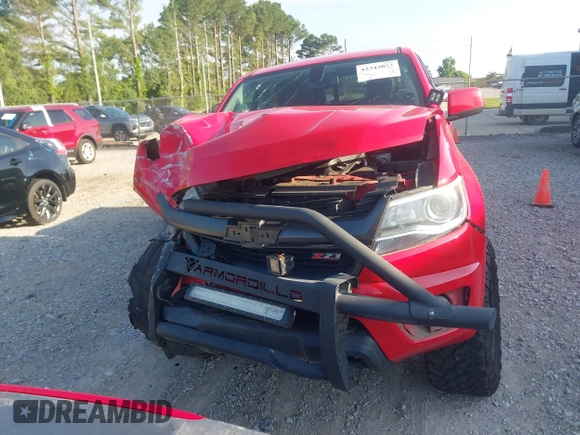 2020 Chevrolet Colorado 4WD Z71 with VIN 1GCGTDEN6L1215253, listed as a IAAI auction lot 42343032 with 61,632 mi miles and . Bid and sale history available at DreamBid. Image 12.