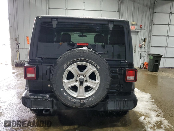 2020 Jeep Wrangler Sport S with VIN 1C4GJXAN0LW131400, listed as a Copart auction lot 44266995 with 73,576 mi miles and Salvage title. Bid and sale history available at DreamBid. Image 6.
