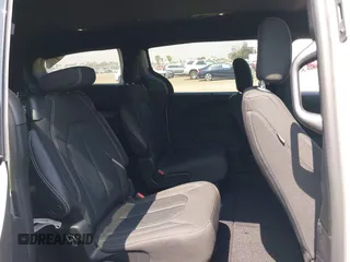 2021 Chrysler Pacifica Touring with VIN 2C4RC1FG7MR605587, listed as a IAAI auction lot 42329028 with 111,305 mi miles and . Bid and sale history available at DreamBid. Image 8.