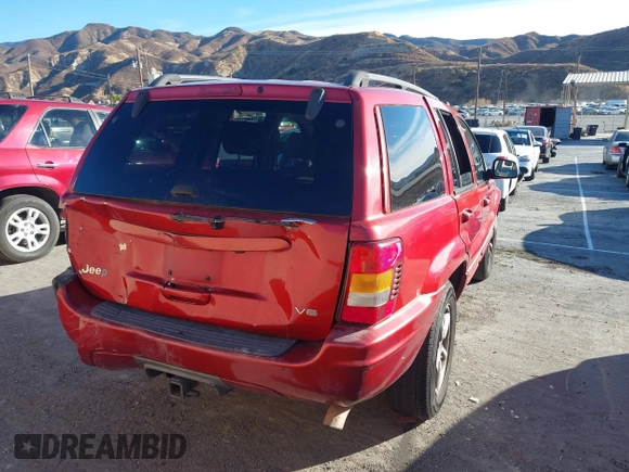 2002 Jeep Grand Cherokee Limited with VIN 1J8GX58N92C186560, listed as a IAAI auction lot 41383003 with 206,195 mi miles and . Bid and sale history available at DreamBid. Image 4.