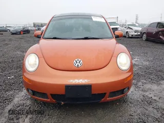 2010 Volkswagen New Beetle Coupe with VIN 3VWRG3AG3AM024689, listed as a IAAI auction lot 41037756 with 102,180 mi miles. Bid and sale history available at carsss.com. Image 12.