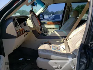 2004 Lincoln Navigator Luxury with VIN 5LMFU27R04LJ12874, listed as a Copart auction lot 76061434 with 243,480 mi miles and Salvage Title. Bid and sale history available at carsss.com. Image 7.