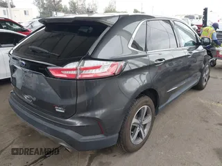 2020 Ford Edge SEL z VIN 2FMPK3J95LBA27779, wystawiony jako IAAI lot #42139536 z przebiegiem 58 285 mil mil oraz . Historia ofert i sprzedaży dostępna na DreamBid. Obrazek 4.