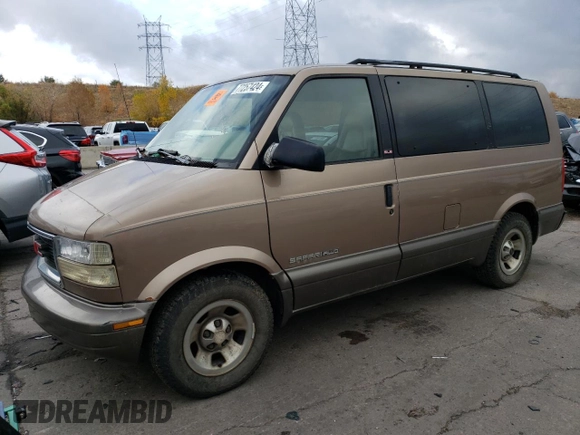 1999 GMC Safari z VIN 1GKEL19W4XB506220, wystawiony jako Copart lot #77257424 z przebiegiem 151 966 mil mil oraz Czysty tytuł • Clean title. Historia ofert i sprzedaży dostępna na DreamBid. Obrazek 1.