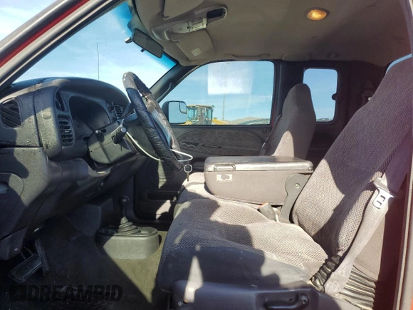 2001 Dodge 1500 with VIN 3B7HF13Z51G250557, listed as a Copart auction lot 85394394 with 216,400 mi miles and Salvage Title. Bid and sale history available at DreamBid. Image 7.