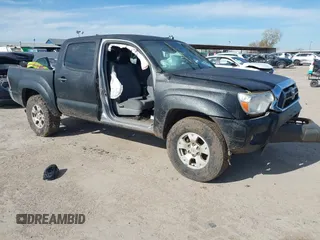 2015 Toyota Tacoma z VIN 3TMLU4ENXFM206669, wystawiony jako IAAI lot #41323365 z przebiegiem 102 297 mil mil oraz . Historia ofert i sprzedaży dostępna na DreamBid. Obrazek 1.