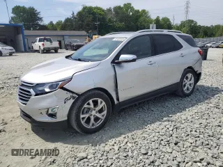 2021 Chevrolet Equinox Premier z VIN 3GNAXNEV0MS164484, wystawiony jako Copart lot #55102515 z przebiegiem 39 527 mil mil oraz Szkoda całkowita • Salvage title. Historia ofert i sprzedaży dostępna na DreamBid. Obrazek 1.