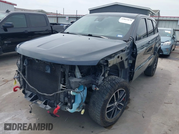2017 Jeep Grand Cherokee Trailhawk with VIN 1C4RJFLG4HC843628, listed as a IAAI auction lot 42053878 with 83,551 mi miles and . Bid and sale history available at DreamBid. Image 19.