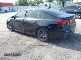 2021 Kia Forte GT-Line z VIN 3KPF34AD9ME326628, wystawiony jako IAAI lot #42675449 z przebiegiem 51 224 mil mil oraz . Historia ofert i sprzedaży dostępna na DreamBid. Obrazek 3.