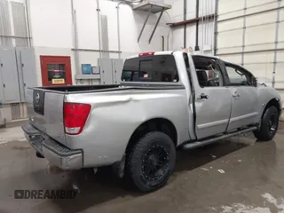 2004 Nissan Titan LE with VIN 1N6AA07B44N512889, listed as a IAAI auction lot 41569019 with 154,655 mi miles. Bid and sale history available at carsss.com. Image 4.