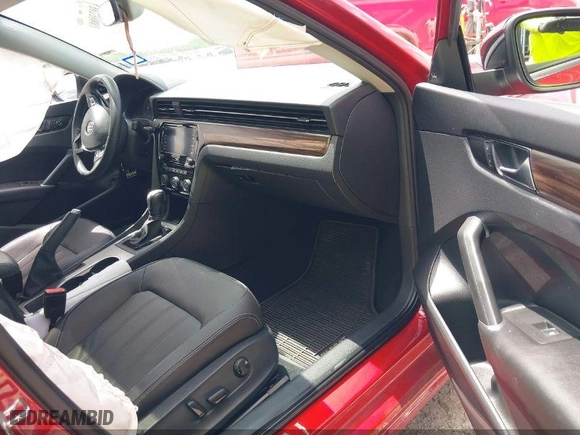 2022 Volkswagen Passat 2.0T Limited Edition with VIN 1VWBA7A30NC010134, listed as a IAAI auction lot 42052451 with 24,923 mi miles. Bid and sale history available at carsss.com. Image 5.