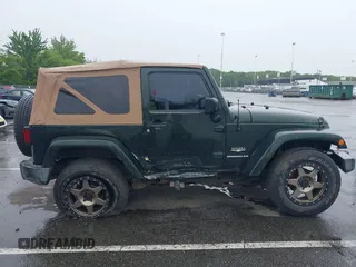 2010 Jeep Wrangler Sahara z VIN 1J4AA5D19AL133321, wystawiony jako IAAI lot #42369872 z przebiegiem 66 930 mil mil oraz . Historia ofert i sprzedaży dostępna na DreamBid. Obrazek 13.