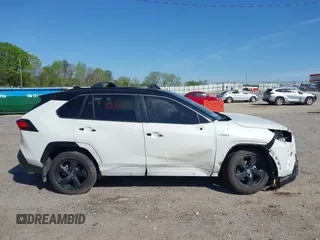 2021 Toyota RAV4 Hybrid XSE with VIN JTME6RFV4MJ008825, listed as a IAAI auction lot 42060148 with 91,129 mi miles and . Bid and sale history available at DreamBid. Image 13.