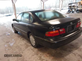 1998 Toyota Avalon XL with VIN 4T1BF18B7WU246141, listed as a IAAI auction lot 41405474 with 266,384 mi miles and . Bid and sale history available at DreamBid. Image 3.