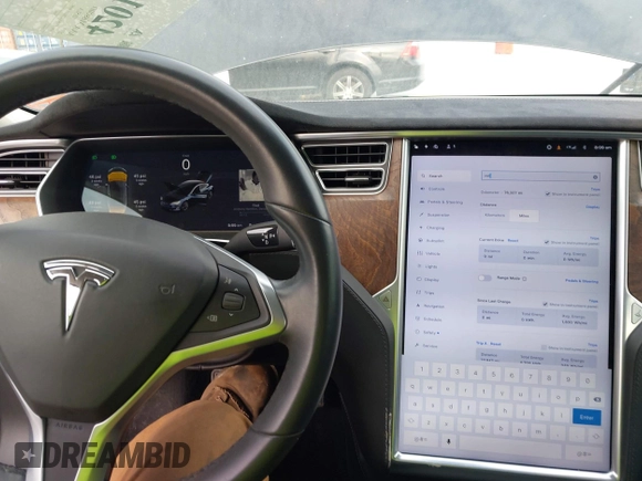 2017 Tesla Model S 100D with VIN 5YJSA1E28HF188981, listed as a IAAI auction lot 42010115 with 76,327 mi miles and . Bid and sale history available at DreamBid. Image 7.