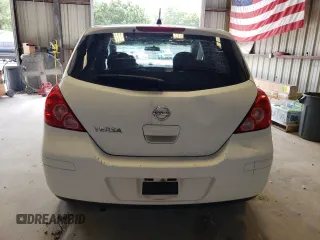 2009 Nissan Versa 1.8 S with VIN 3N1BC13E09L496658, listed as a Copart auction lot 67597234 with 125,854 mi miles and Salvage Title. Bid and sale history available at carsss.com. Image 6.