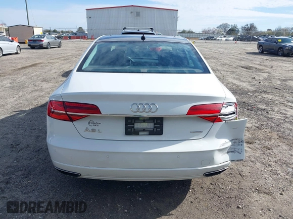 2017 Audi A8 L with VIN WAU44AFD0HN012571, listed as a IAAI auction lot 41717676 with 120,832 mi miles. Bid and sale history available at carsss.com. Image 16.