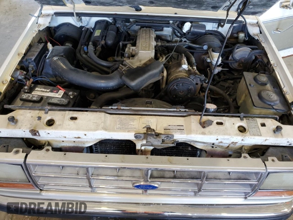 1990 Ford Bronco z VIN 1FMCU14T9LUA62663, wystawiony jako Copart lot #85040114 z przebiegiem 9 963 mil mil oraz Czysty tytuł • Clean title. Historia ofert i sprzedaży dostępna na DreamBid. Obrazek 12.