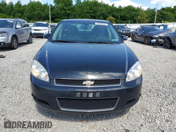 2014 Chevrolet Impala LTZ with VIN 2G1WC5E33E1164638, listed as a Copart auction lot 58699635 with 189,636 mi miles and Salvage title. Bid and sale history available at DreamBid. Image 5.