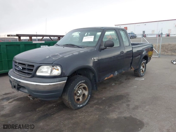 1999 Ford F-150 Work Series with VIN 1FTRX18W2XNA90069, listed as a IAAI auction lot 41496543 with 115,787 mi miles. Bid and sale history available at carsss.com. Image 2.