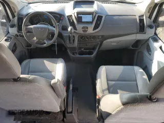 2015 Ford Transit Cargo with VIN 1FTNR2CG1FKA07097, listed as a Copart auction lot 61985765 with 74,100 mi miles and Salvage title. Bid and sale history available at DreamBid. Image 8.