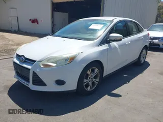 2013 Ford Focus SE z VIN 1FADP3F25DL290446, wystawiony jako IAAI lot #42520571 z przebiegiem 158 020 mil mil oraz . Historia ofert i sprzedaży dostępna na DreamBid. Obrazek 2.