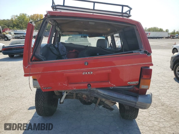 1996 Jeep Cherokee Country with VIN 1J4FJ78S9TL130605, listed as a Copart auction lot 74673934 with 196,857 mi miles and Salvage Title. Bid and sale history available at carsss.com. Image 6.