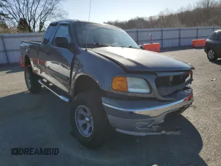 2004 Ford F-150 XL with VIN 2FTRX18W74CA39541, listed as a Copart auction lot 50390125 with Not provided miles and Salvage title. Bid and sale history available at DreamBid. Image 4.