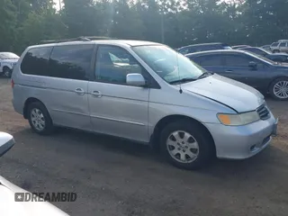 2003 Honda Odyssey EX-L with VIN 5FNRL18913B061340, listed as a IAAI auction lot 42633790 with 1,281,195 mi miles and . Bid and sale history available at DreamBid. Image 12.