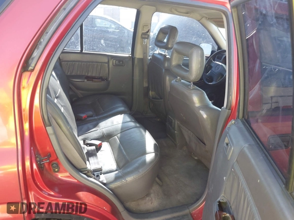 1999 Isuzu Rodeo S z VIN 4S2CK58W3X4307201, wystawiony jako IAAI lot #41884901 z przebiegiem 236 970 mil mil oraz . Historia ofert i sprzedaży dostępna na DreamBid. Obrazek 8.