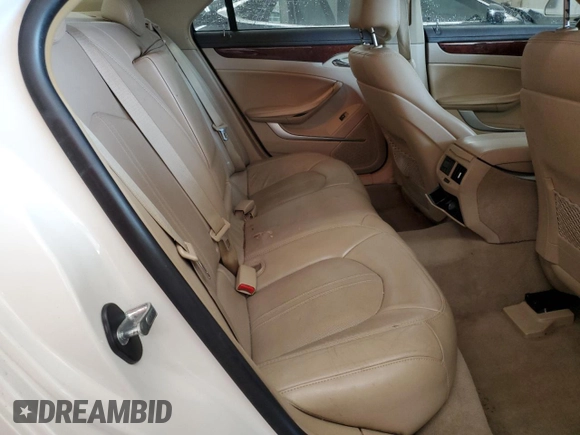2012 Cadillac CTS Luxury with VIN 1G6DG5E57C0125969, listed as a Copart auction lot 49002865 with 105,800 mi miles and Salvage Title. Bid and sale history available at DreamBid. Image 10.