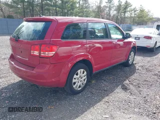 2013 Dodge Journey SE with VIN 3C4PDCABXDT721228, listed as a IAAI auction lot 41662172 with 311,815 mi miles. Bid and sale history available at carsss.com. Image 4.