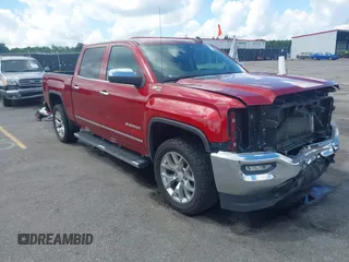 2018 GMC Sierra 1500 SLT z VIN 3GTU2NEC8JG600189, wystawiony jako IAAI lot #42241579 z przebiegiem 174 506 mil mil oraz . Historia ofert i sprzedaży dostępna na DreamBid. Obrazek 1.