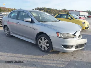 2015 Mitsubishi Lancer ES with VIN JA32U2FU8FU022850, listed as a IAAI auction lot 40731290 with 101,673 mi miles. Bid and sale history available at carsss.com. Image 1.