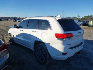 2017 Jeep Grand Cherokee Overland with VIN 1C4RJFCG8HC641729, listed as a IAAI auction lot 41233125 with 116,874 mi miles. Bid and sale history available at carsss.com. Image 14.