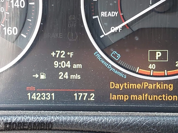 2013 BMW 3 Series 335i xDrive with VIN WBA3B9C54DF587421, listed as a IAAI auction lot 42165857 with 142,331 mi miles. Bid and sale history available at carsss.com. Image 15.