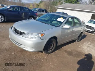 2004 Toyota Camry LE with VIN 4T1BE32K64U282875, listed as a IAAI auction lot 42038006 with 238,605 mi miles. Bid and sale history available at carsss.com. Image 18.