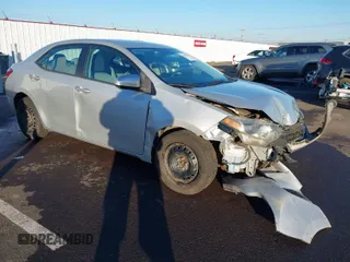 2015 Toyota Corolla L z VIN 2T1BURHE6FC448906, wystawiony jako IAAI lot #41409274 z przebiegiem 141 893 mil mil oraz . Historia ofert i sprzedaży dostępna na DreamBid. Obrazek 1.