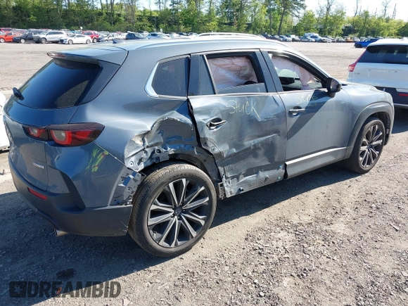 2023 Mazda CX-50 S Premium Plus with VIN 7MMVABEM8PN108020, listed as a IAAI auction lot 42203568 with 26,783 mi miles and . Bid and sale history available at DreamBid. Image 4.