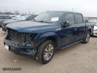 2018 Ford F-150 XL with VIN 1FTEW1CP2JFC00220, listed as a IAAI auction lot 41557424 with 263,032 mi miles. Bid and sale history available at carsss.com. Image 2.